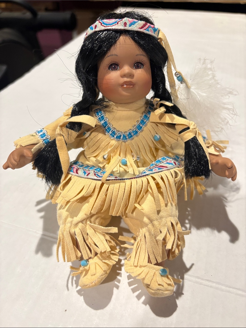 Yellow Fringe Native-Style porcelain Doll with Bead Accents